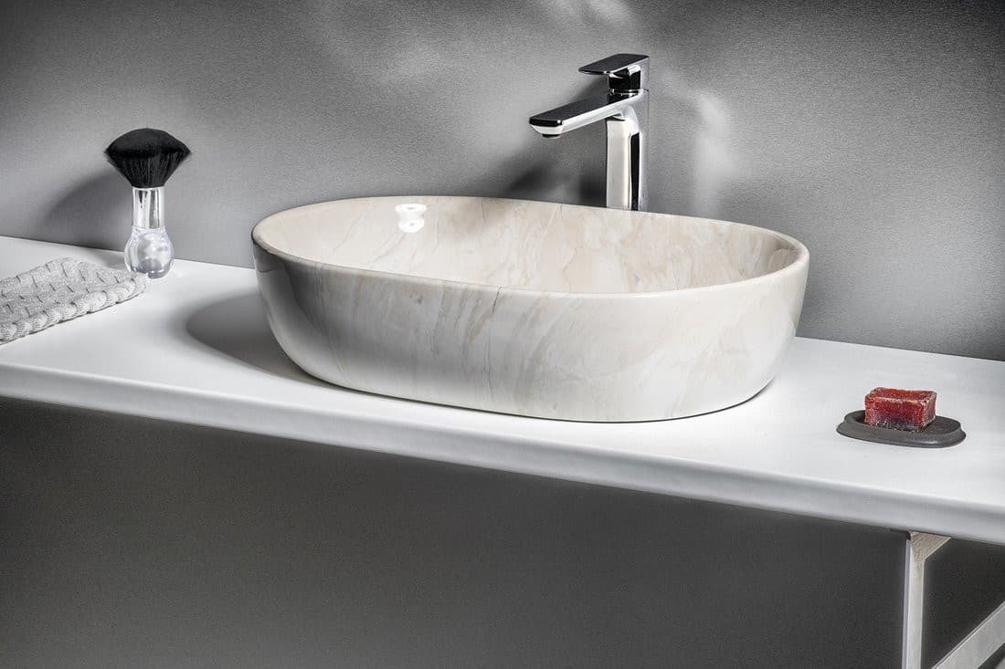 DALMA ceramiczna umywalka nablatowa 59x42 cm beżowa owalna